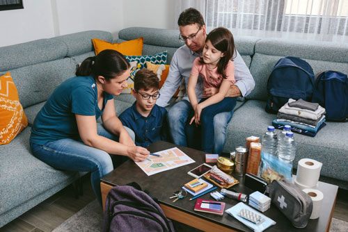 Family making emergency readiness kit