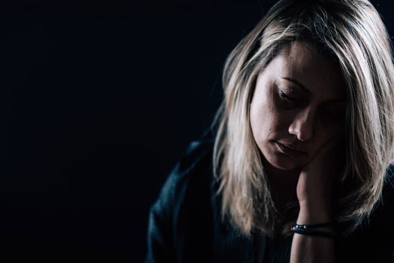 depression dark portrait of a depressed woman