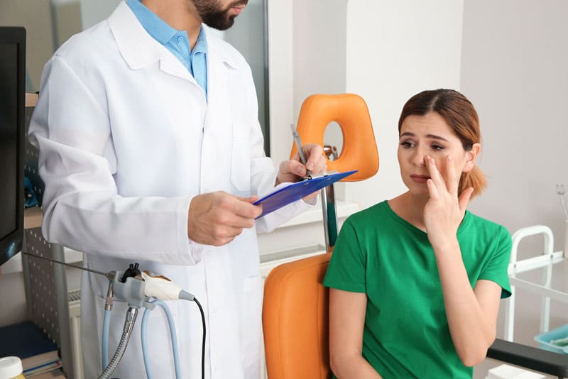 Woman being examined by doctor